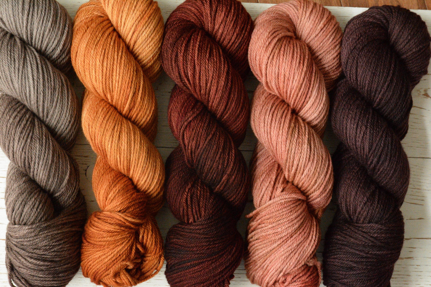 Pink Clay - 4-ply 100% non-super wash worsted weight merino yarn. 100g, 218 yards, dusky peach pink clay tones. Soft 20.5 micron.