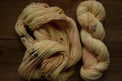 Champagne Sunrise - warm yellow peach tones 3-ply hand-dyed DK 100% non-super wash merino. Soft 17.8 micron 99.9 percent comfort factor