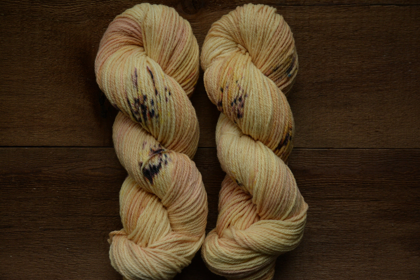 Champagne Sunrise - warm yellow peach tones 3-ply hand-dyed DK 100% non-super wash merino. Soft 17.8 micron 99.9 percent comfort factor