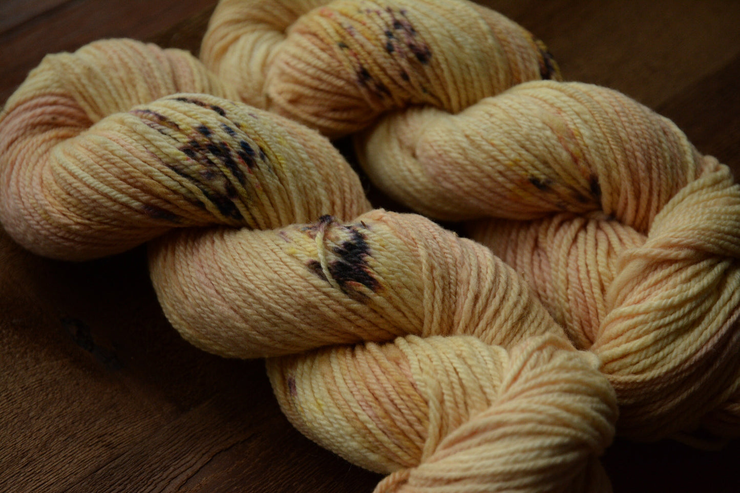 Champagne Sunrise - warm yellow peach tones 3-ply hand-dyed DK 100% non-super wash merino. Soft 17.8 micron 99.9 percent comfort factor