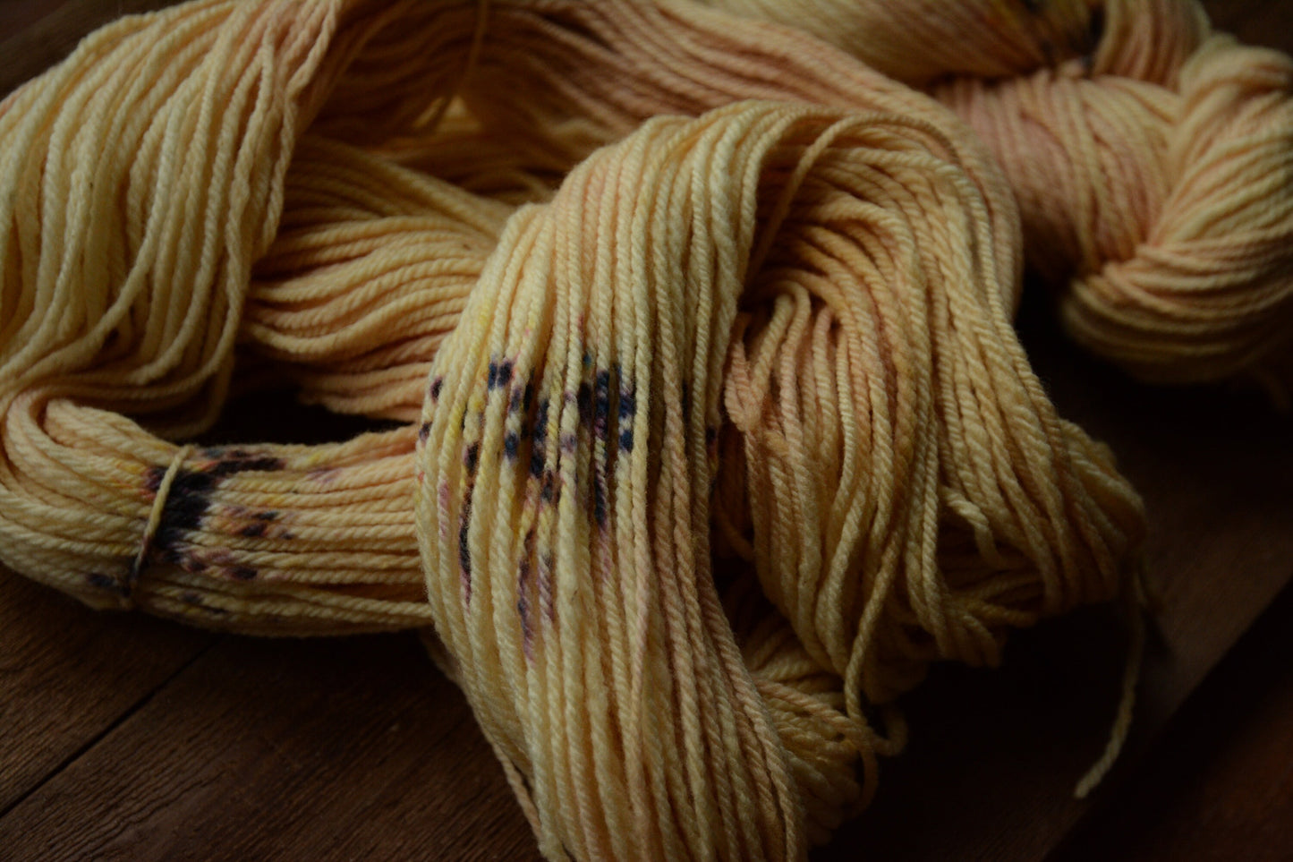 Champagne Sunrise - warm yellow peach tones 3-ply hand-dyed DK 100% non-super wash merino. Soft 17.8 micron 99.9 percent comfort factor