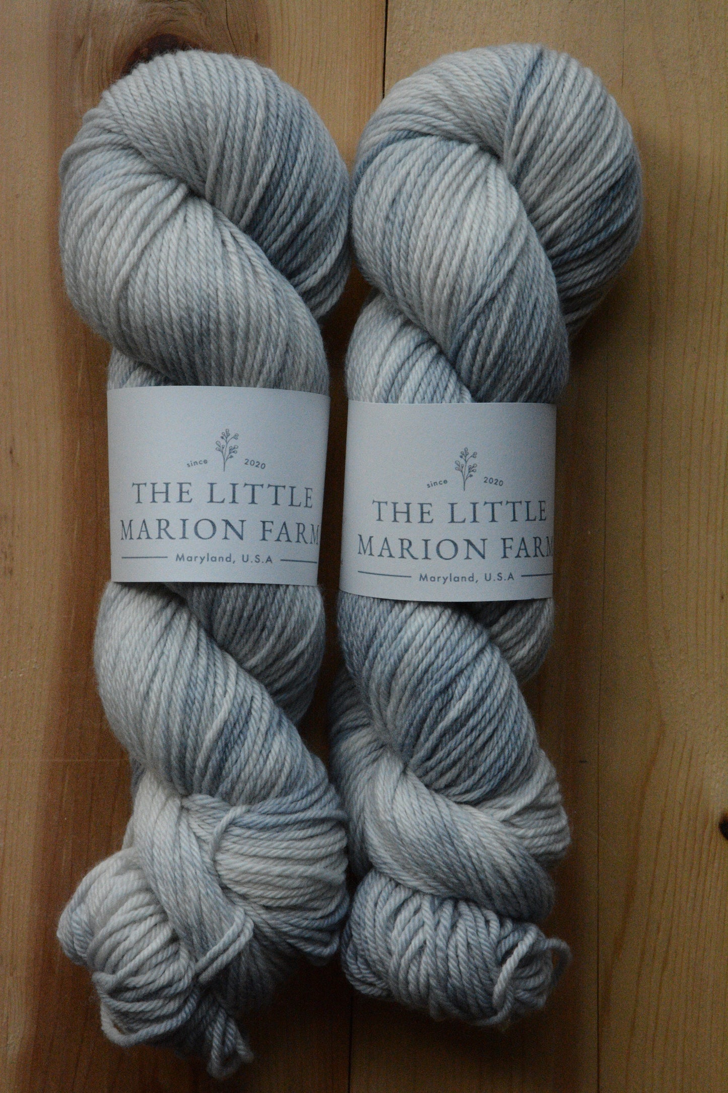 Cloud - 4-ply 100% non-super wash worsted merino yarn. 100g, 218 yards, soft splashes of grays, blue-gray. Soft 20.5 micron.