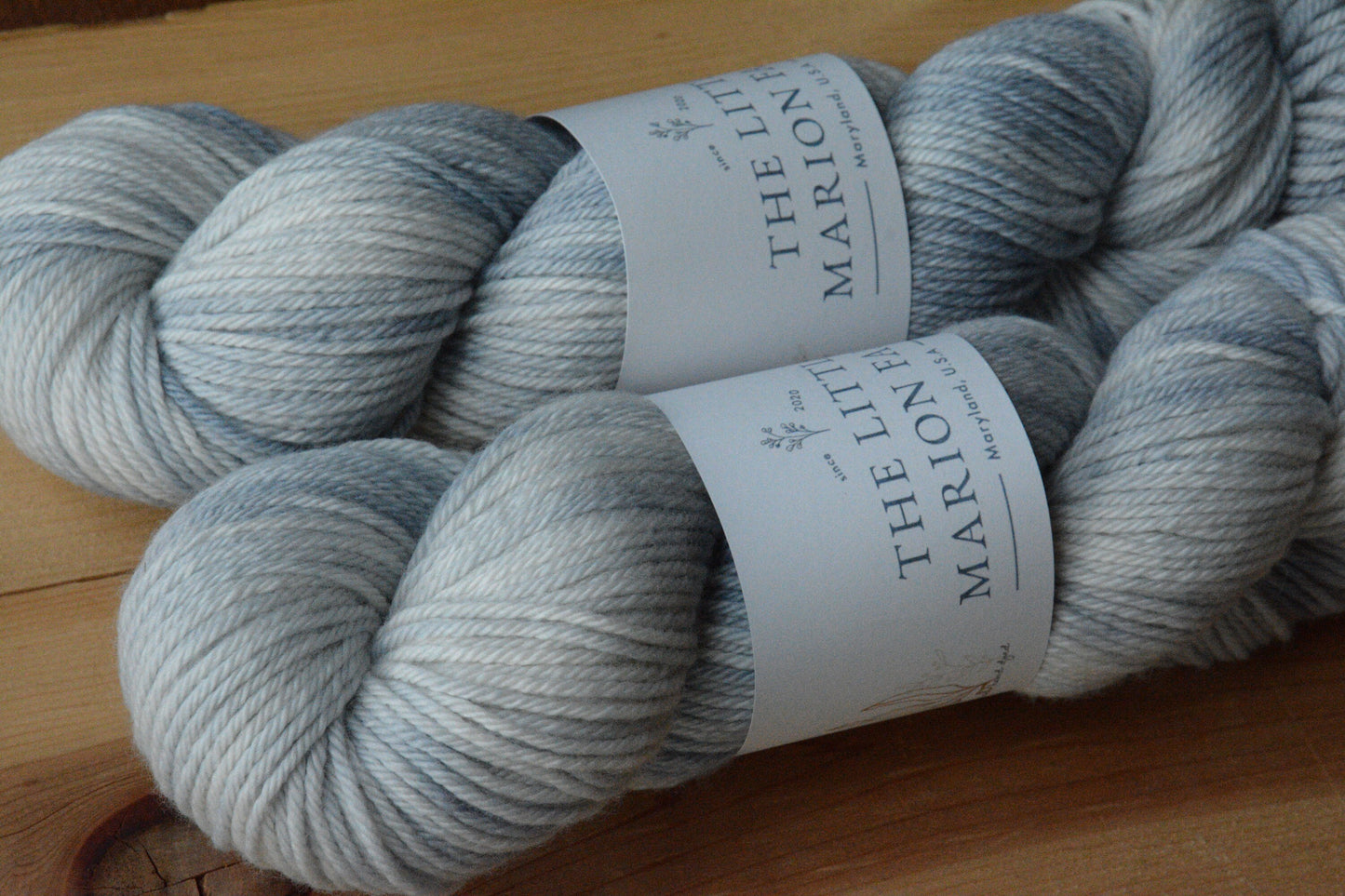 Cloud - 4-ply 100% non-super wash worsted merino yarn. 100g, 218 yards, soft splashes of grays, blue-gray. Soft 20.5 micron.