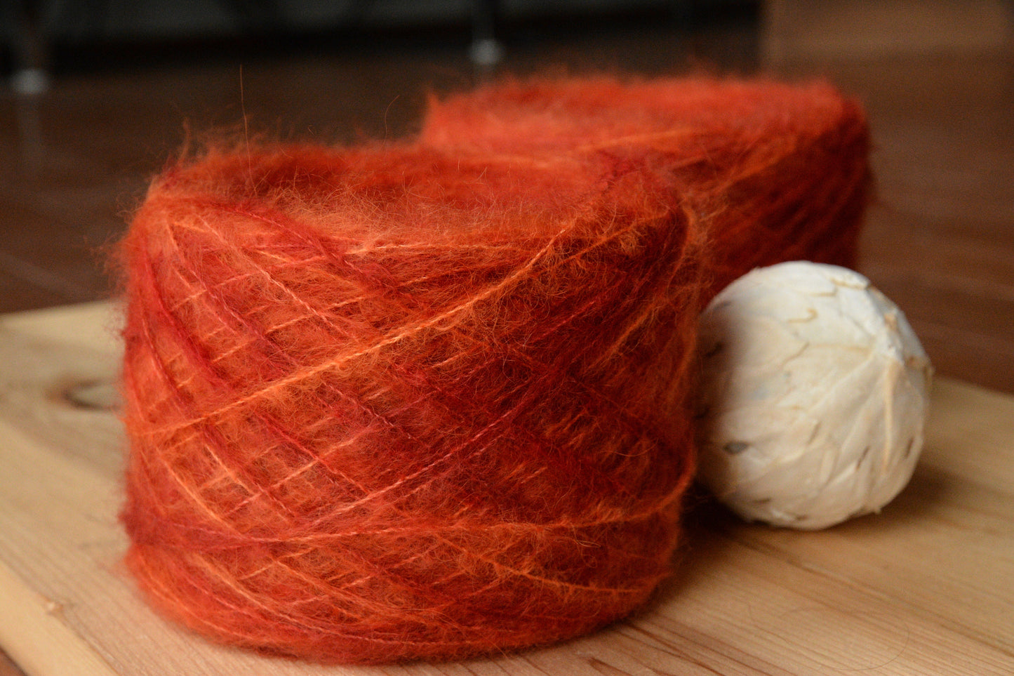 Blood Orange - brushed lace weight 74 per cent baby suri alpaca 26 per cent silk, 50g 328 yards, orange red. Silk core. Soft, extra fluffy.