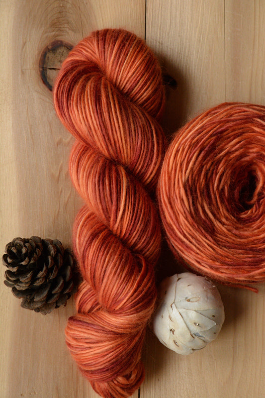 Blood Orange - DK single ply 40 per cent super fine baby alpaca 40 per cent extra fine merino 20 per cent silk, 100g 252 yards, orange red.