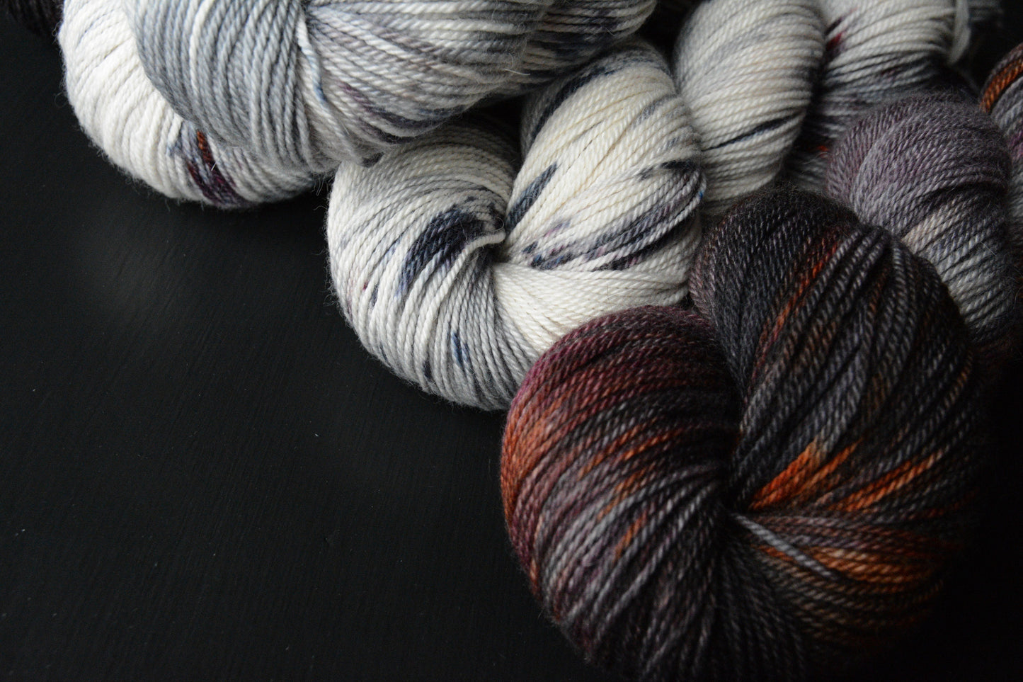 The Drive - alpaca merino blend 3 ply non-super wash sport weight yarn. 100g 328 yards, gray, burgundy wine, orange, black. Super soft yarn.