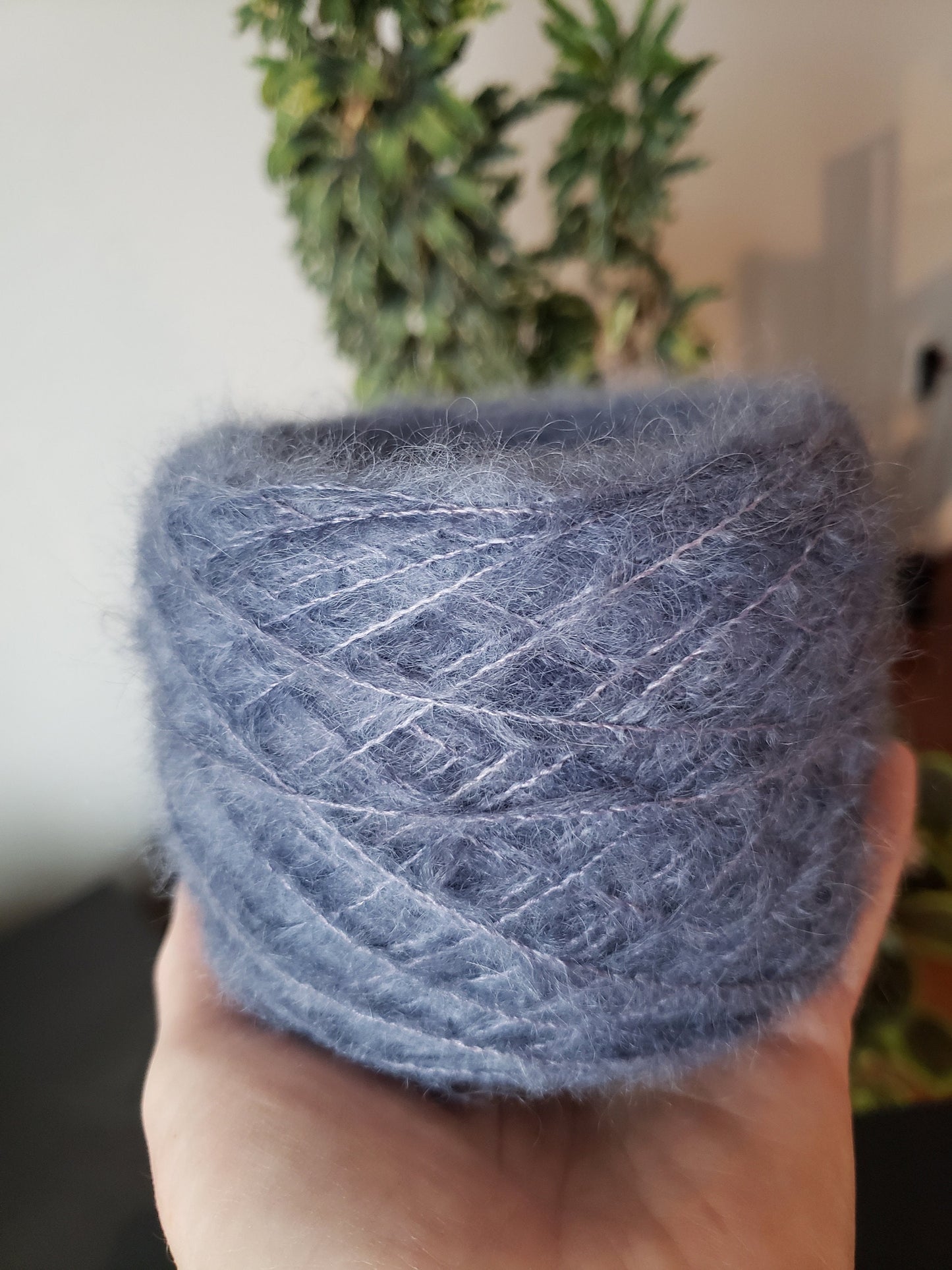 Birds of a Feather - brushed lace weight 74 per cent baby suri alpaca 26 per cent silk 50g 328 yards, silk core. Soft blue gray.