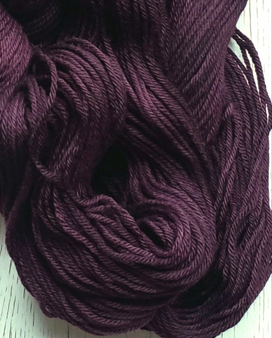 Mulberry - 4-ply 100% non-super wash worsted weight merino yarn. 100g, 218 yards, deep reddish purple. Soft 20.5 micron. Semi-solid.