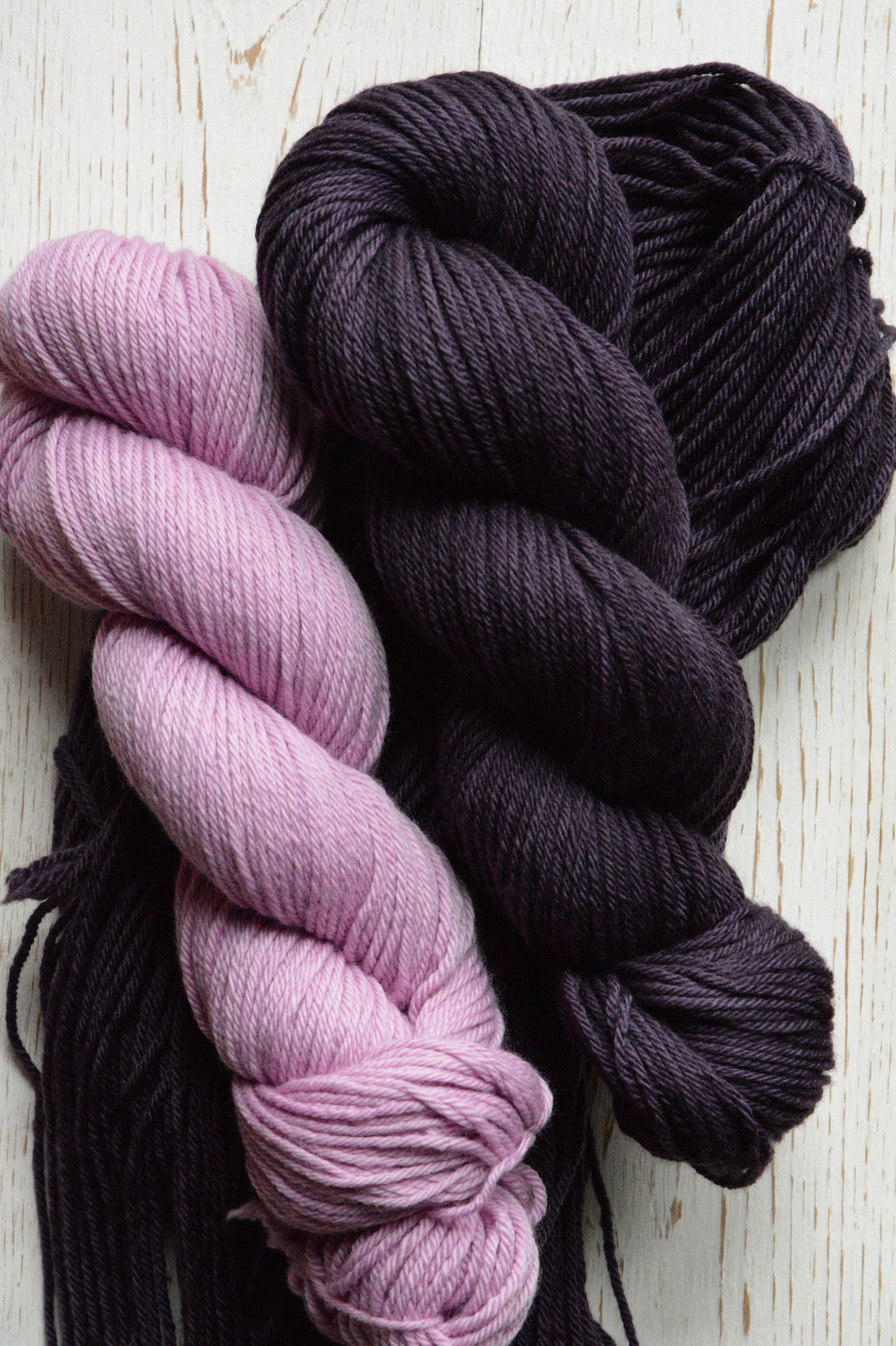 Damson - 4-ply 100% non-super wash worsted weight merino yarn. 100g, 218 yards, deep plum purple. Soft 20.5 micron. Semi-solid.