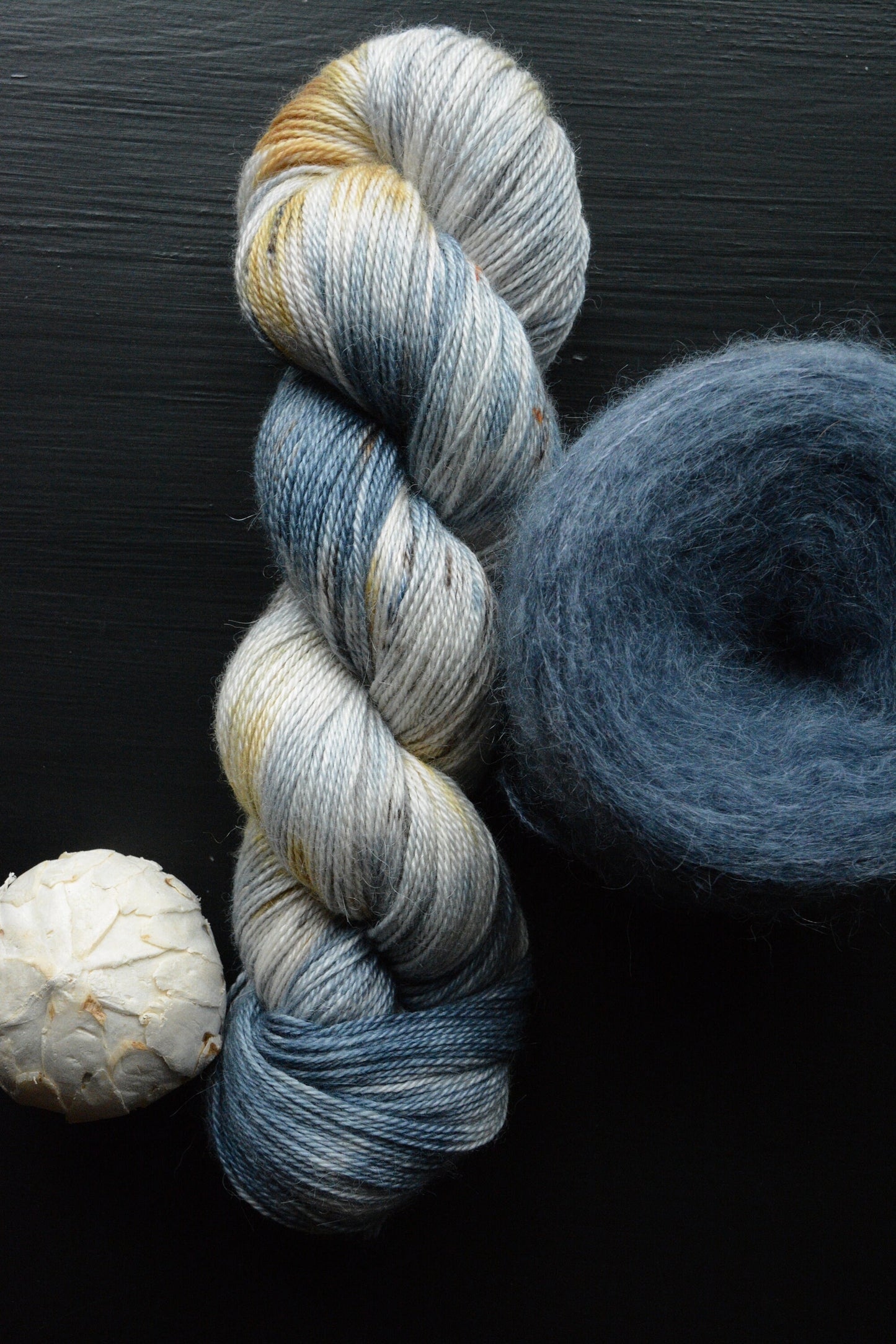 Birds of a Feather - brushed lace weight 74 per cent baby suri alpaca 26 per cent silk 50g 328 yards, silk core. Soft blue gray.