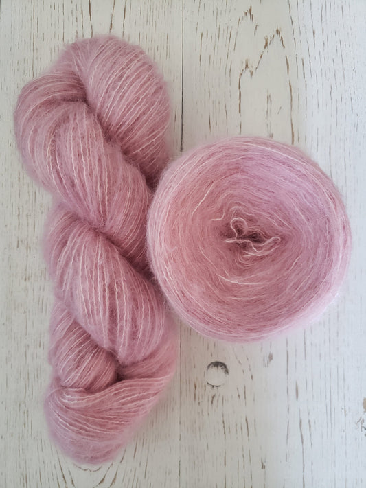 Blush - brushed lace weight 74 per cent baby suri alpaca 26 per cent silk 50g 328 yards, silk core. Soft crisp, light rose pink tonal.