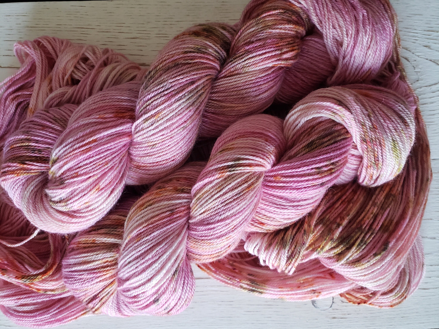 Wax flower - alpaca merino blend 3 ply non-super wash sport weight yarn. 100g, 328 yards, pink with saffron, green and brown speckles