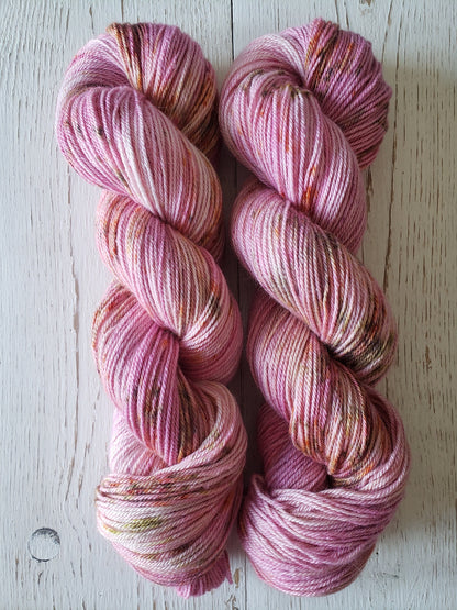 Wax flower - alpaca merino blend 3 ply non-super wash sport weight yarn. 100g, 328 yards, pink with saffron, green and brown speckles