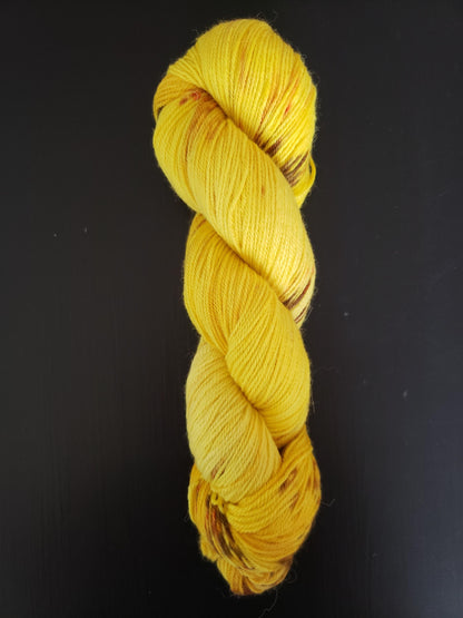 Sunflower - alpaca merino blend, sport weight yarn, non-super wash, 100g 328 yds, sunny yellow with brown and orange speckles, super soft.