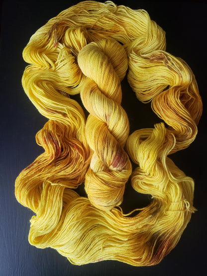 Sunflower - alpaca merino blend, sport weight yarn, non-super wash, 100g 328 yds, sunny yellow with brown and orange speckles, super soft.