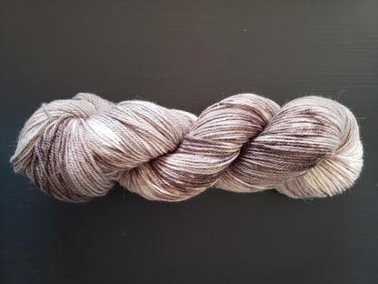 Sparrow - alpaca merino blend, sport weight yarn, non-super wash, 100g 328 yds, warm gray brown with brown speckles.