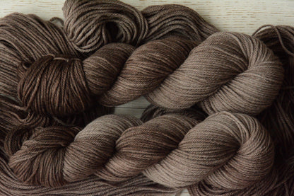 Mushroom - 4-ply 100% non-super wash worsted weight merino yarn. 100g, 218 yards, warm gray brown taupe. Soft 20.5 micron.