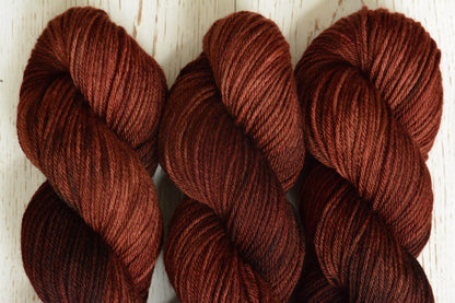 Russet - 4-ply 100% non-super wash worsted weight merino yarn. 100g, 218 yards, russet brown orange red, autumnal. Soft 20.5 micron.