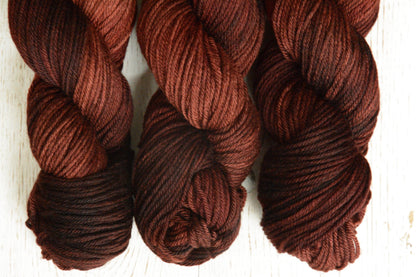 Russet - 4-ply 100% non-super wash worsted weight merino yarn. 100g, 218 yards, russet brown orange red, autumnal. Soft 20.5 micron.