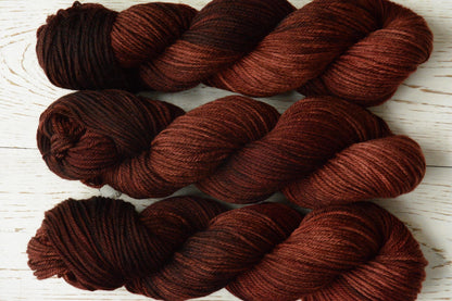 Russet - 4-ply 100% non-super wash worsted weight merino yarn. 100g, 218 yards, russet brown orange red, autumnal. Soft 20.5 micron.