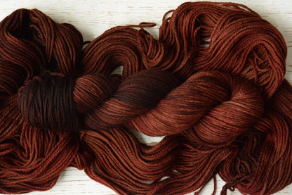 Russet - 4-ply 100% non-super wash worsted weight merino yarn. 100g, 218 yards, russet brown orange red, autumnal. Soft 20.5 micron.