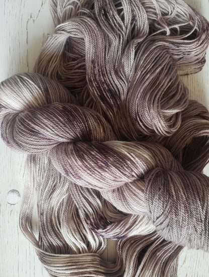 Sparrow - alpaca merino blend, sport weight yarn, non-super wash, 100g 328 yds, warm gray brown with brown speckles.