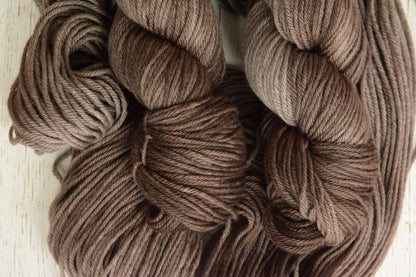 Mushroom - 4-ply 100% non-super wash worsted weight merino yarn. 100g, 218 yards, warm gray brown taupe. Soft 20.5 micron.