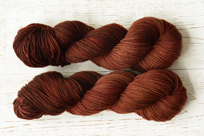 Russet - 4-ply 100% non-super wash worsted weight merino yarn. 100g, 218 yards, russet brown orange red, autumnal. Soft 20.5 micron.