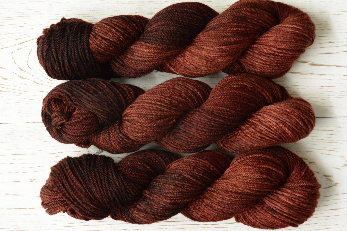 Russet - 4-ply 100% non-super wash worsted weight merino yarn. 100g, 218 yards, russet brown orange red, autumnal. Soft 20.5 micron.