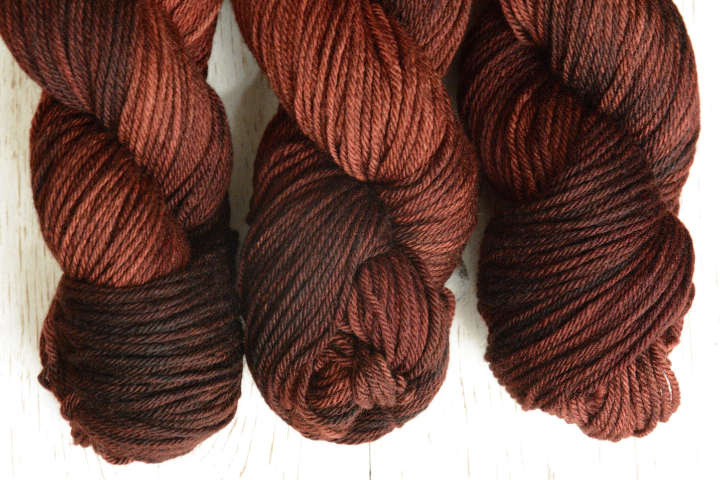 Russet - 4-ply 100% non-super wash worsted weight merino yarn. 100g, 218 yards, russet brown orange red, autumnal. Soft 20.5 micron.